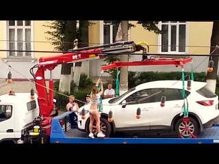 funny - the girl made a striptease on the tow truck