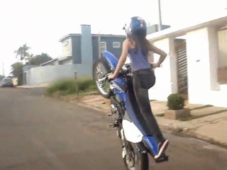 girl burning on a motorcycle